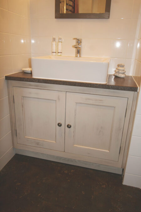 Aged Vanity Unit with black stipple finish granite. Knights Country Kitchens