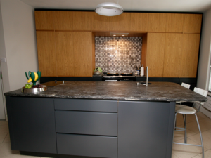 This Contemporary Town House required an ultra modern design with dark grey kitchen cupboards coupled with beautiful Oak surrounds.