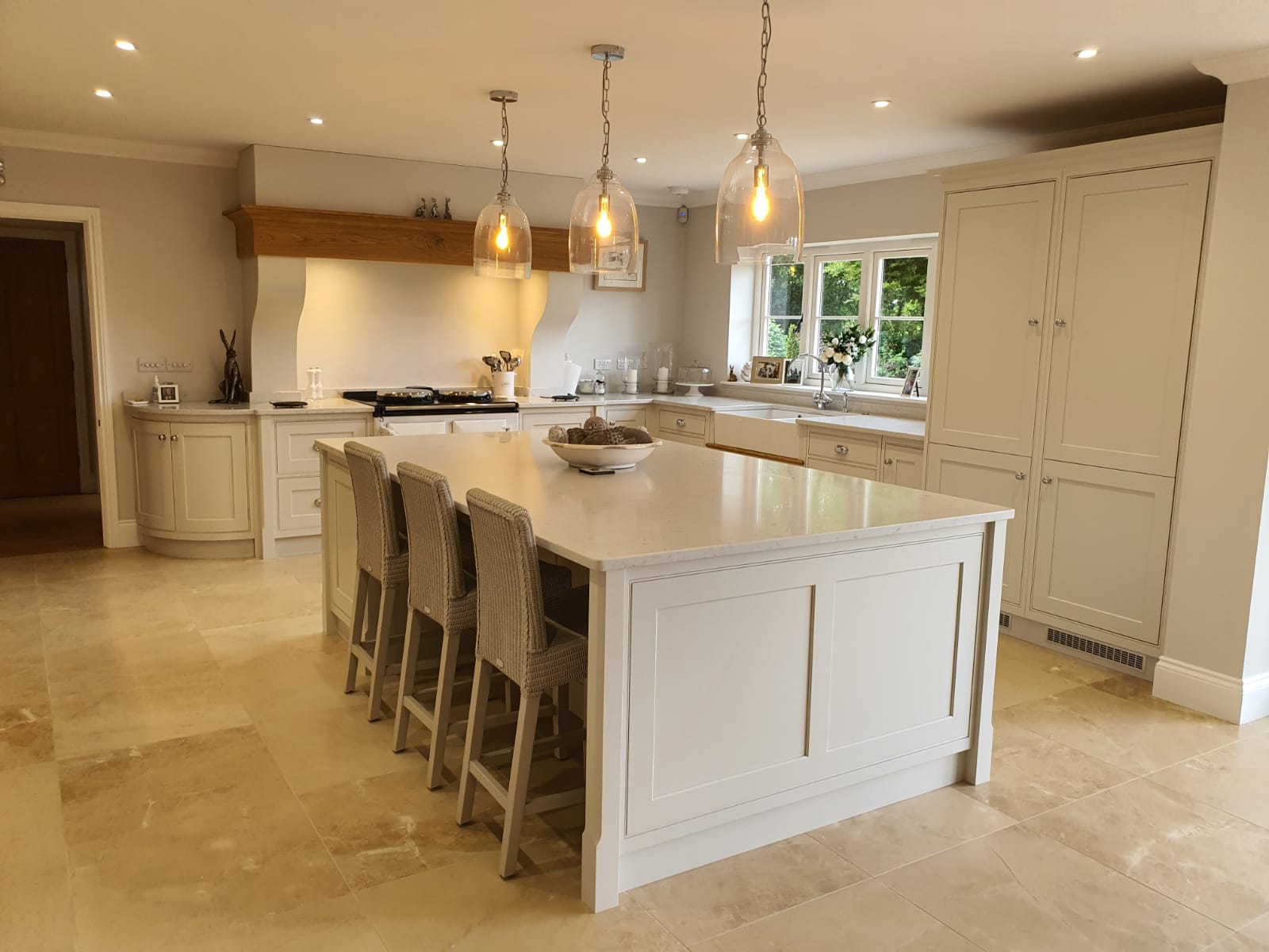 Desired Dream Kitchen an impressive family kitchen with clean lines and oak accents. Design, manufactured and installed by Knights Country Kitchens.