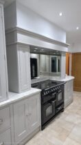 Take a look at this kitchen transformation in Essex. Grey Galley Style Kitchen. Lasting design with expert craftmanship.