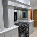 Take a look at this kitchen transformation in Essex. Grey Galley Style Kitchen. Lasting design with expert craftmanship.