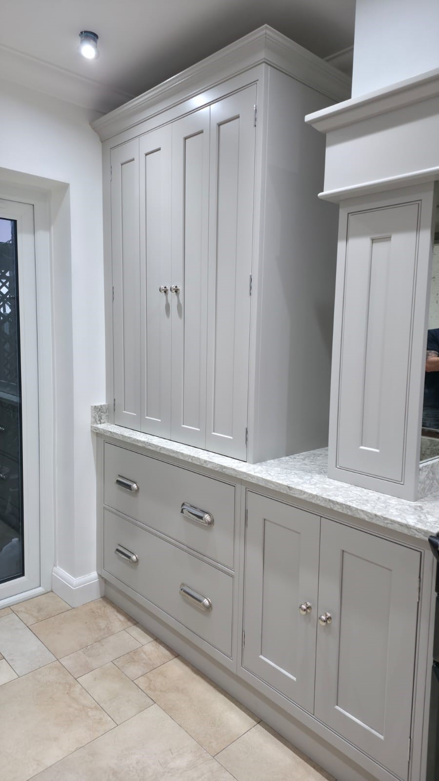 Take a look at this kitchen transformation in Essex. Grey Galley Style Kitchen. Lasting design with expert craftmanship.