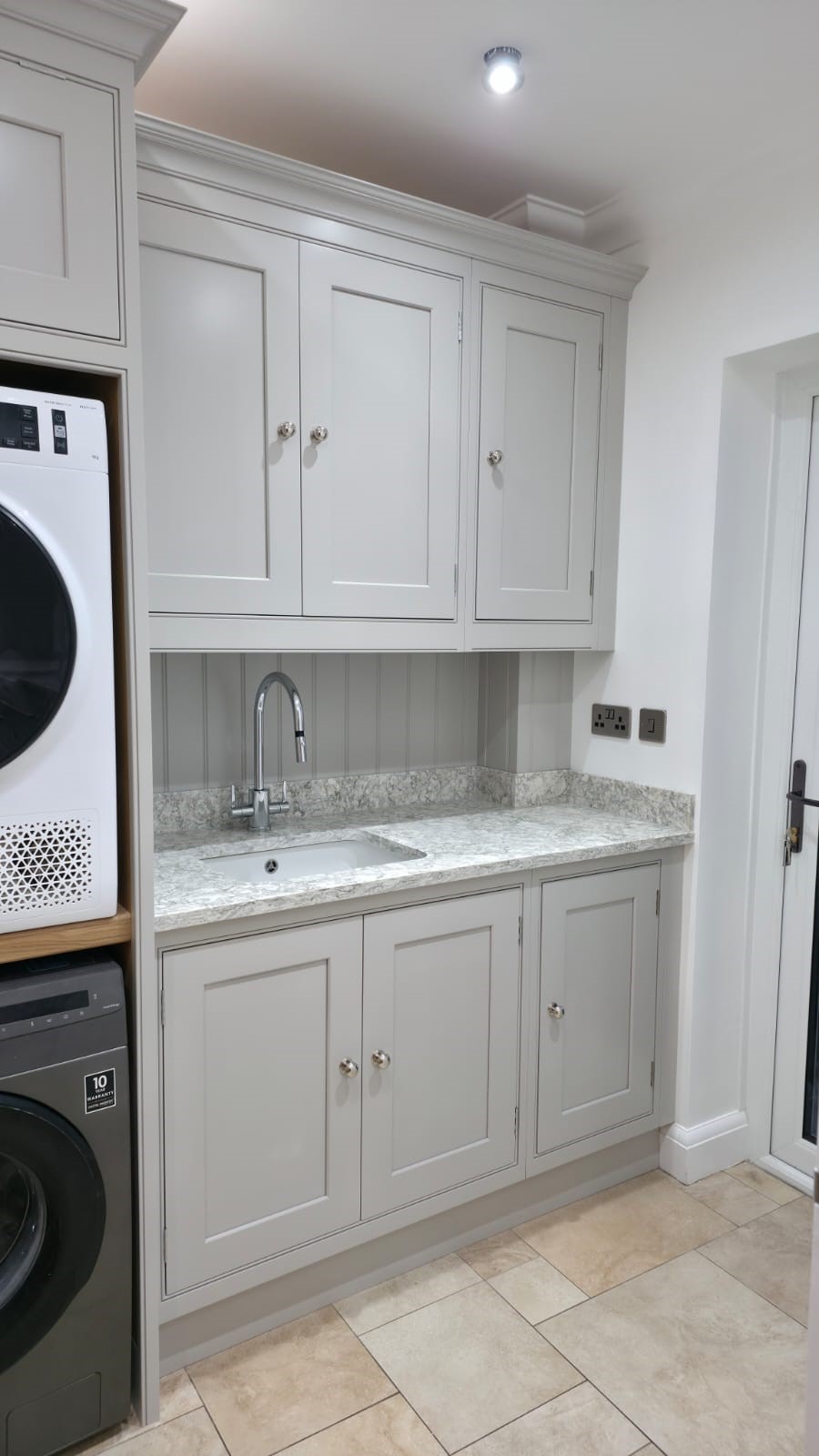 Take a look at this kitchen transformation in Essex. Grey Galley Style Kitchen. Lasting design with expert craftmanship.