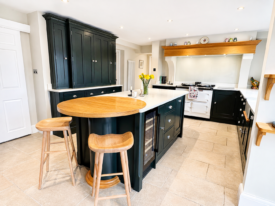 The Beauty of Bespoke Kitchen Details. Take a look at a handcrafted kitchen with integrated chopping boards. Warm Wood Tones Kitchen
