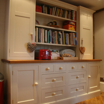 Farmhouse Dresser painted in antique ivory and with oak worktop.
